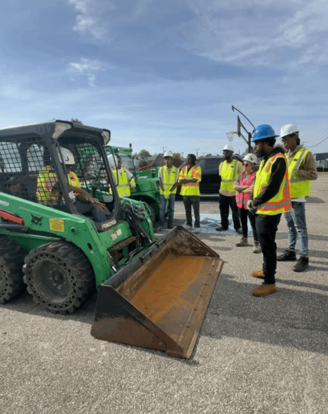 Workforce development training session at a construction site